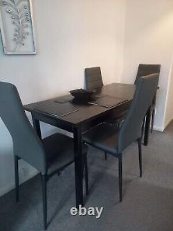 Black Dining table + 4 Grey Cushioned Chairs Set