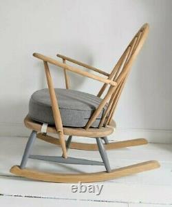 Blonde Ercol rocking chair with new cushion