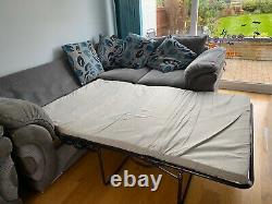 Large left hand cornerbed grey and blue cushions with a matching chair Sofaworks