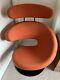 The Varier Peel Chair & Foot Stool Orange Fabric Black Base