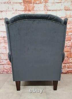 Wing Back Queen Anne Chair Grey Quilted Seating area with plain grey soft fabric