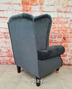 Wing Back Queen Anne Chair Grey Quilted Seating area with plain grey soft fabric