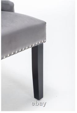 Chaise de salle à manger grise en velours de luxe avec anneau de heurtoir de porte, design moderne intemporel
