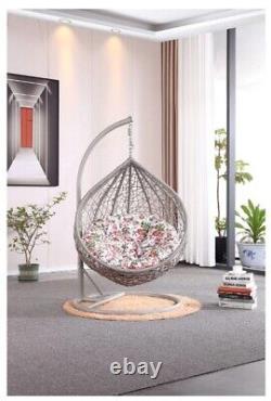 Chaise suspendue en forme d'œuf pour enfants MOBEXPERT gris avec support et coussin floral rouge.